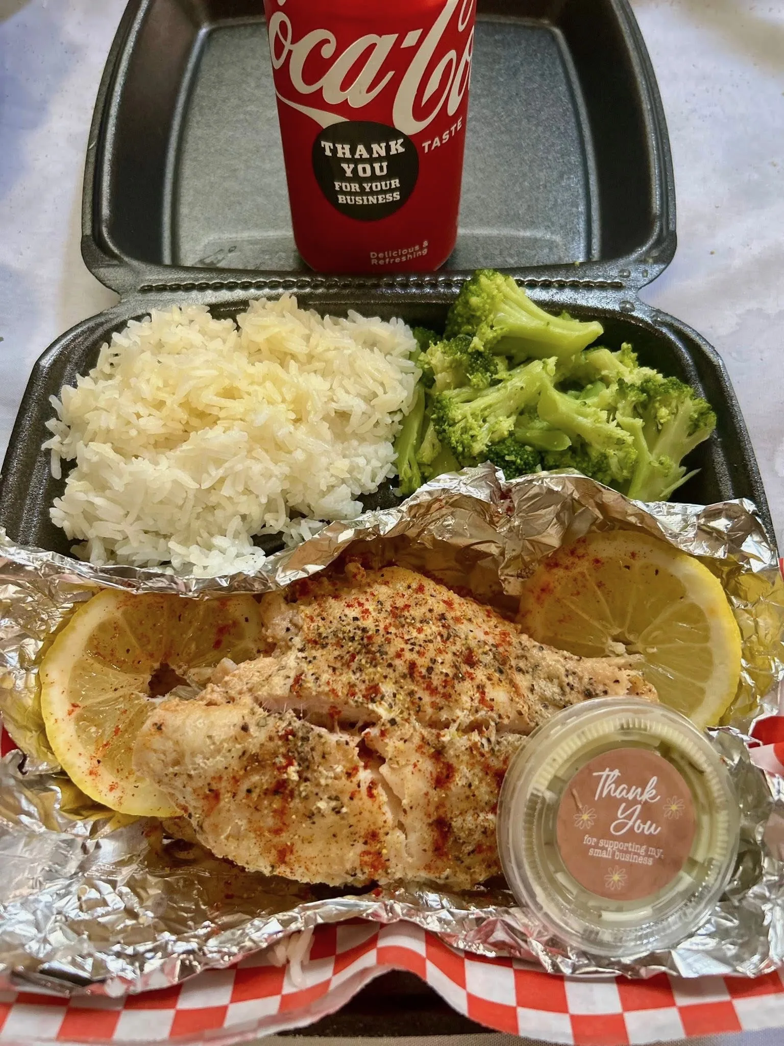 Fish with rice and broccoli, alternate view