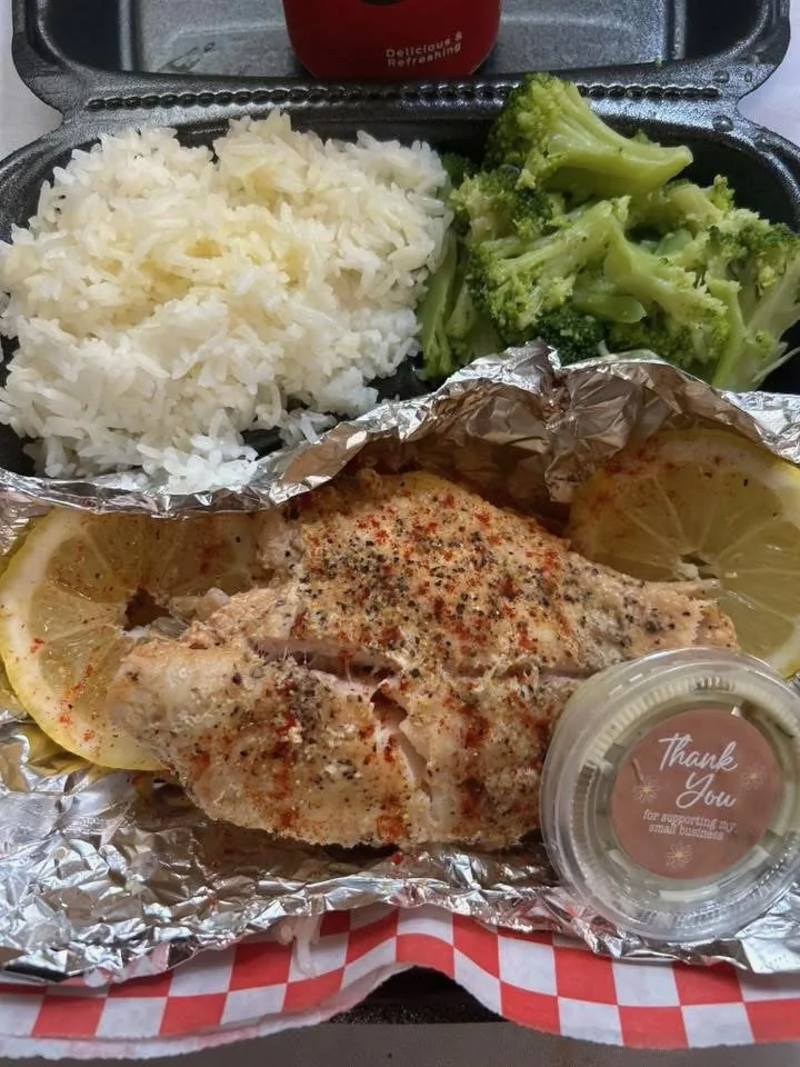 Fish with rice and broccoli