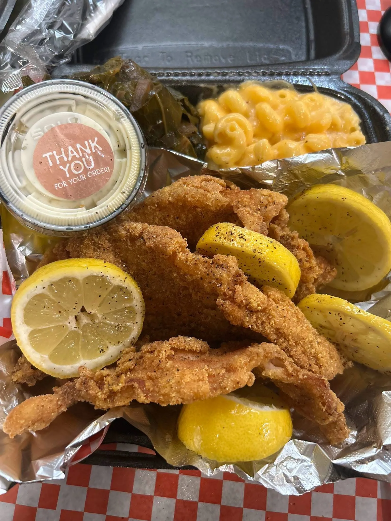 Fried catfish with collard greens and potato salad